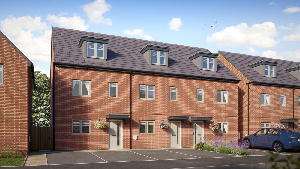 A 3 storey, 3-bedroom house with parking for two cars at he front